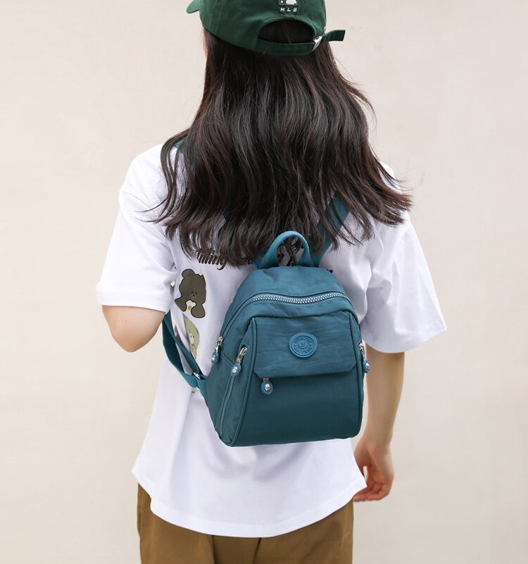Bolso de Espalda Vertical de Tela para Dama Modelo 0650